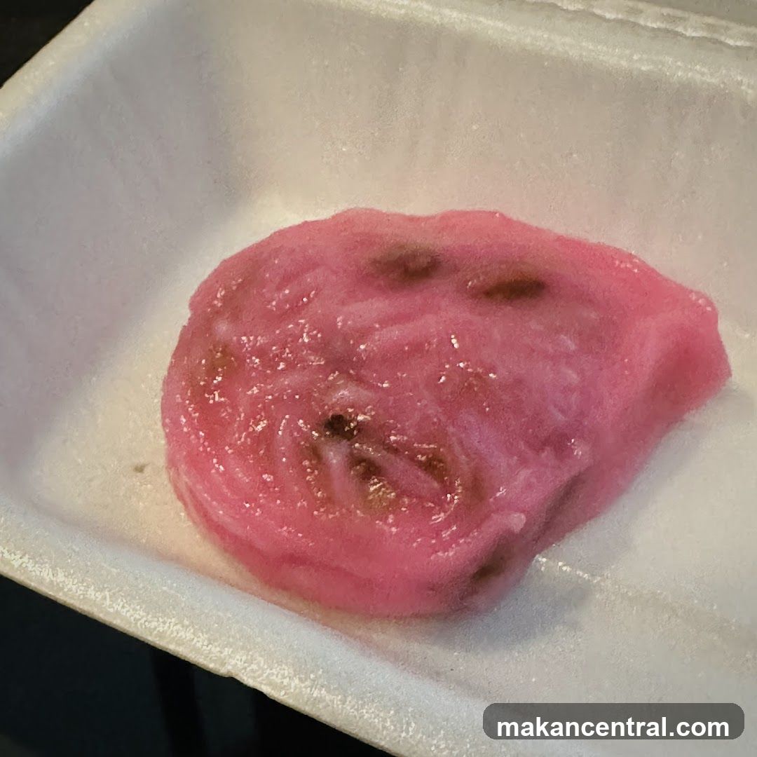 Pink Food Item in Foil Container