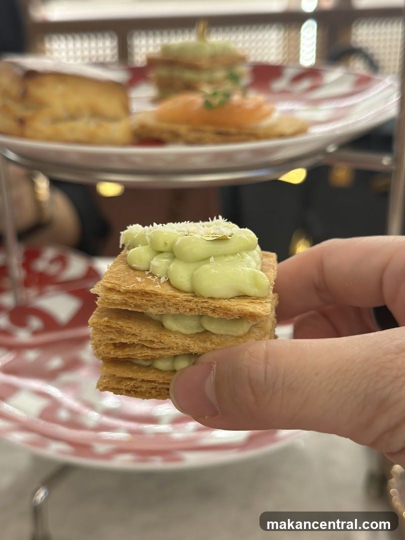 Hand holding dessert at a café