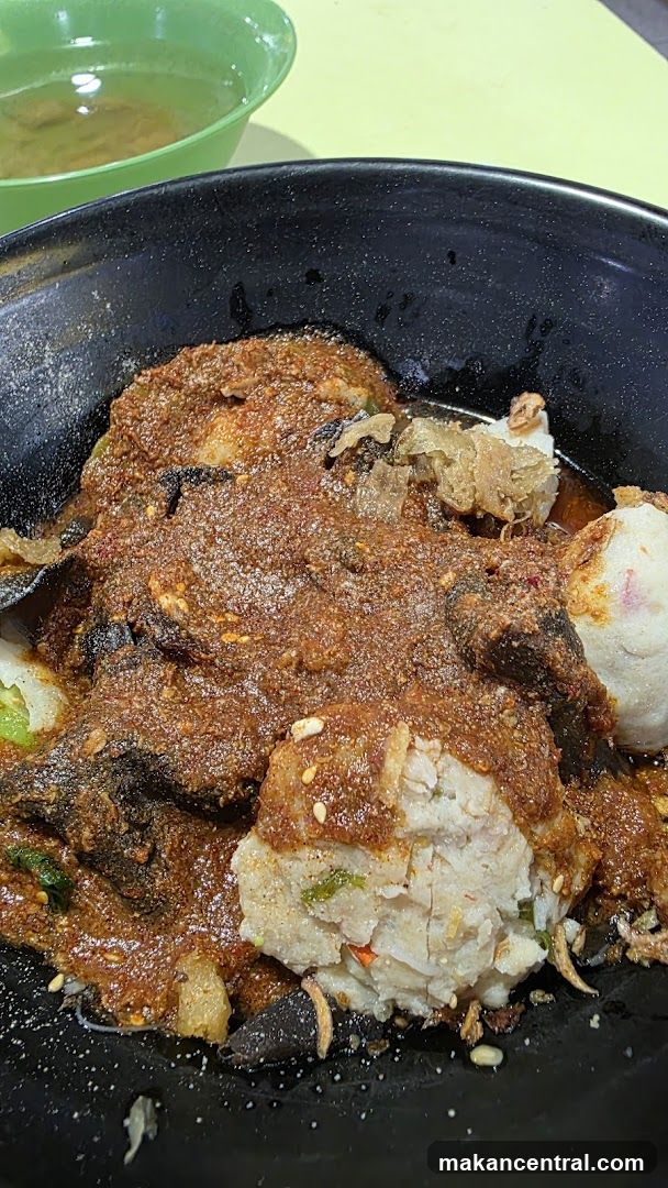 Food dish in black bowl