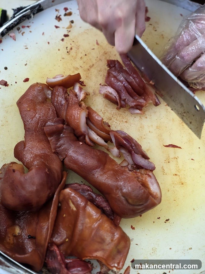 Cutting cooked pork