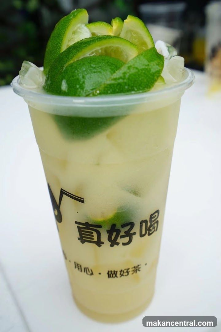 Lime-infused beverage in plastic cup