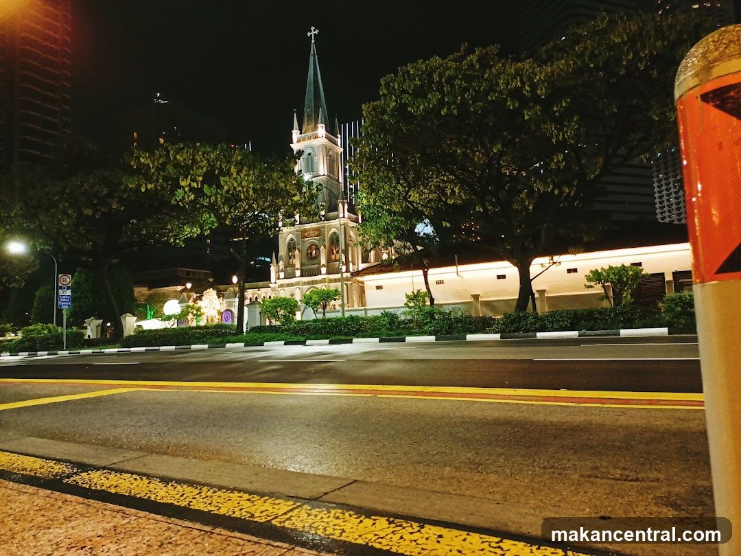 Nighttime urban street view with illuminated church
