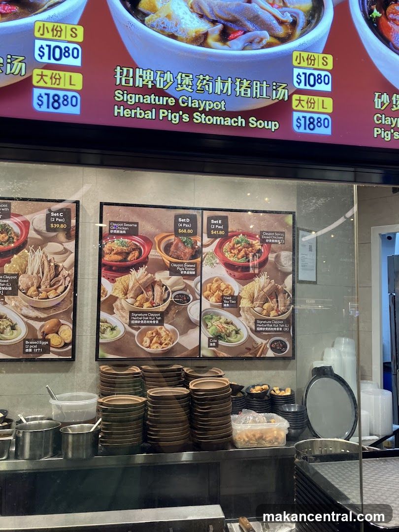 Restaurant interior with claypot soup display