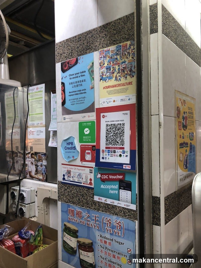 Wall-mounted promotional posters and payment QR codes