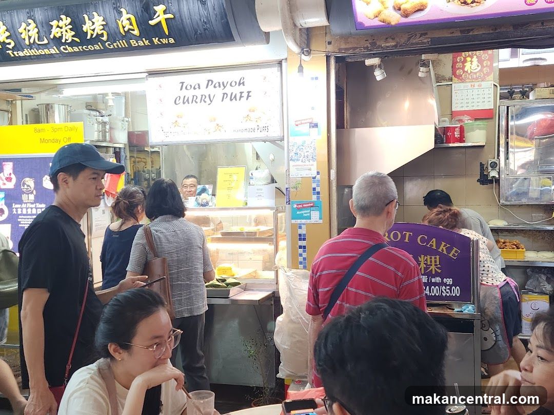 Food stall interior with customers