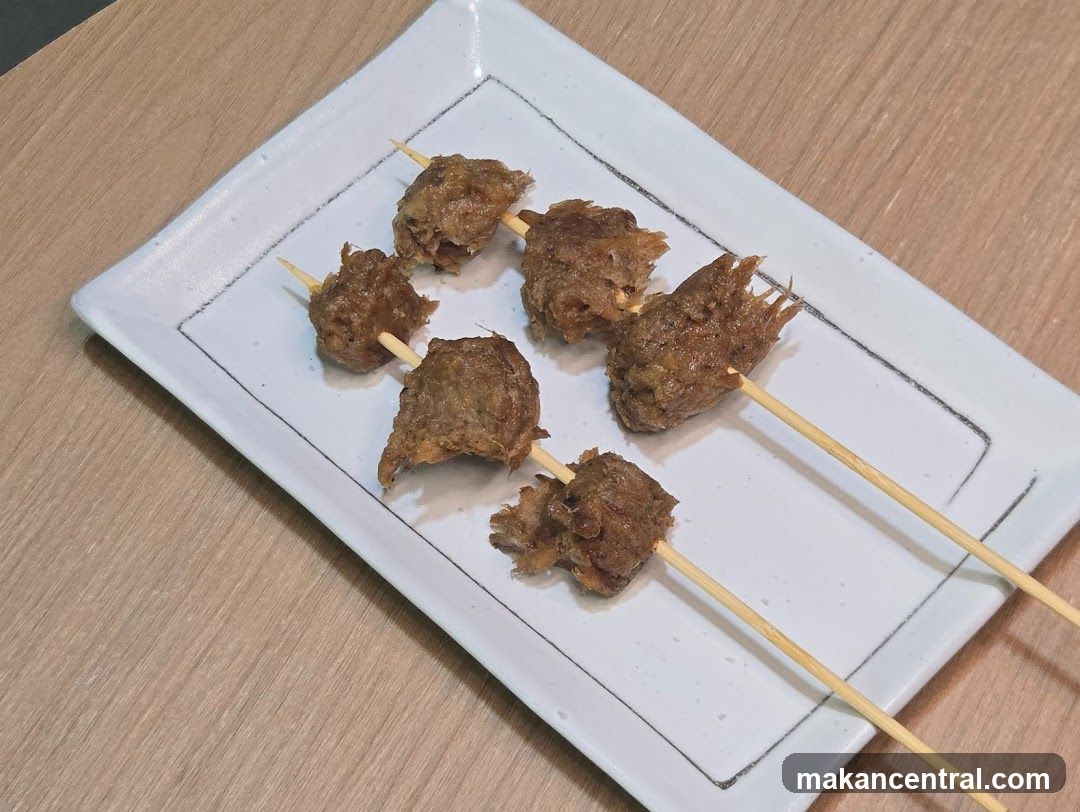 Grilled Meat Skewers on Plate