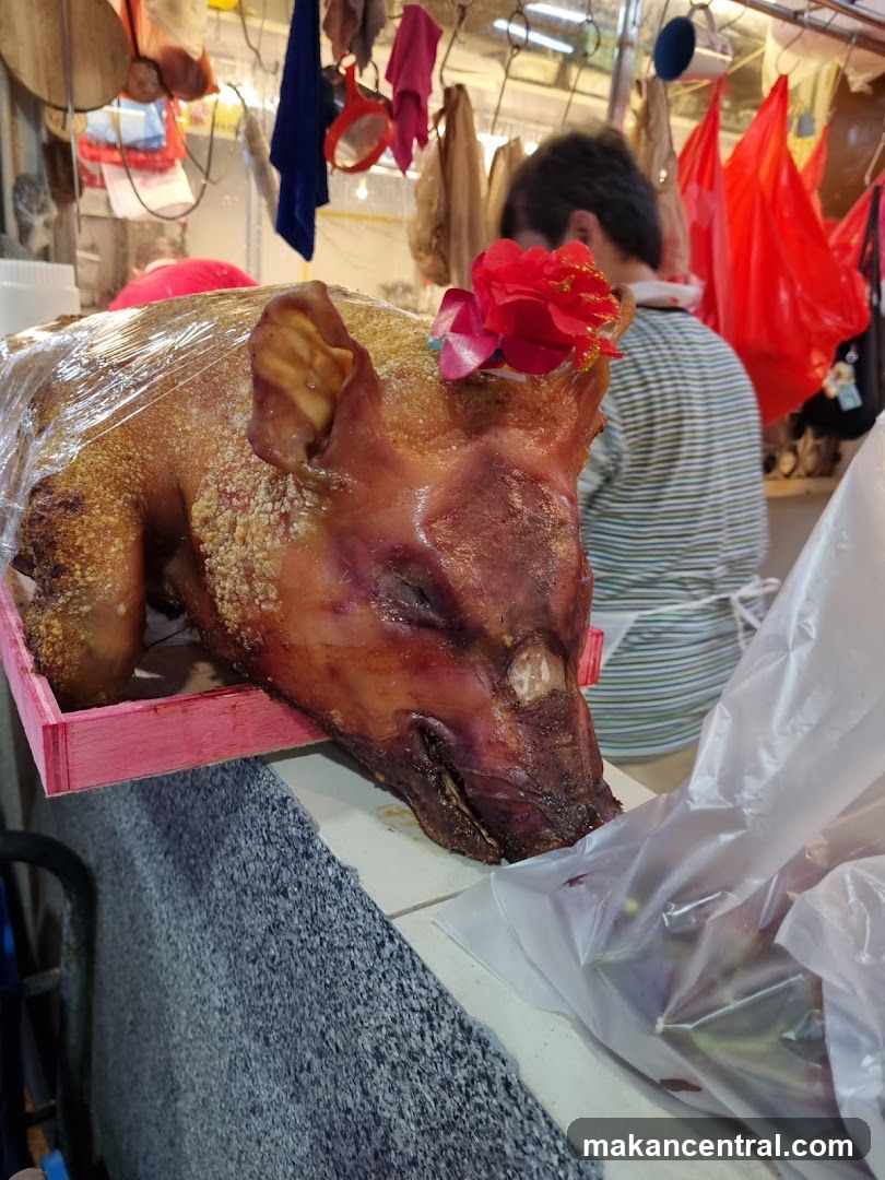 Roasted Pig at Market Stall