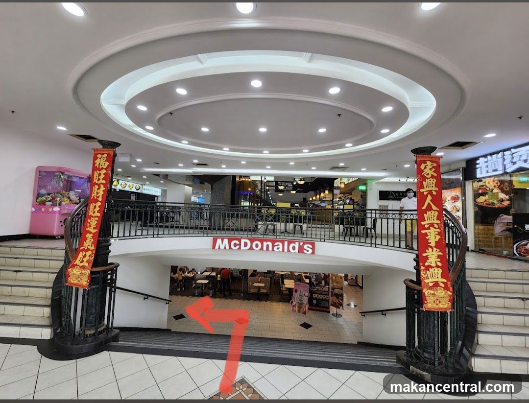 Interior of shopping mall with McDonald's signage