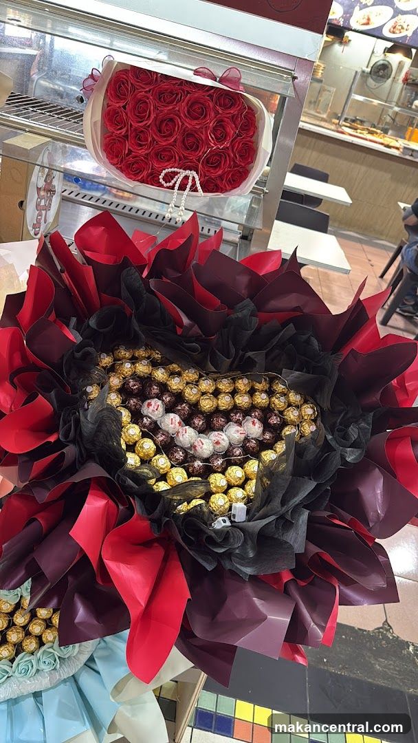 Floral and Chocolate Arrangements in Indoor Setting