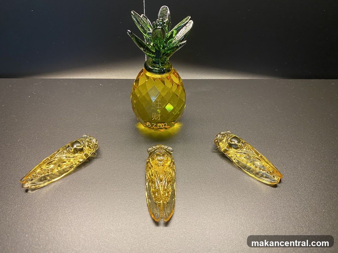 Glass Pineapple and Cicada Figurines