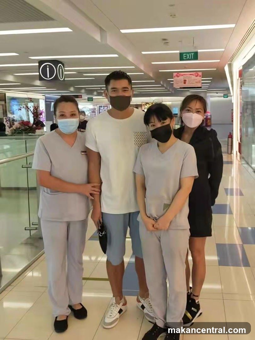 People in a Mall Corridor