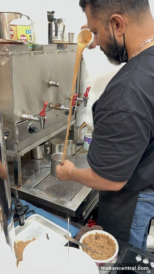 Man Pouring Tea