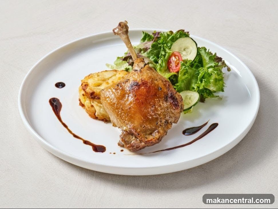 Duck Confit with Potato Gratin and Salad