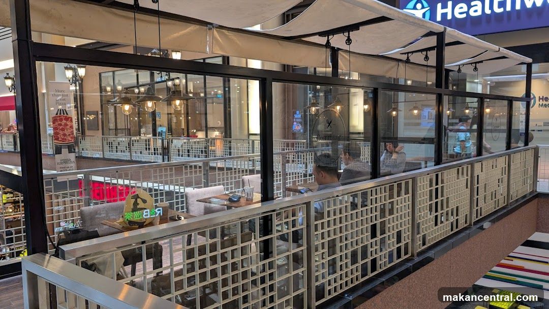 Indoor dining area with glass partitions