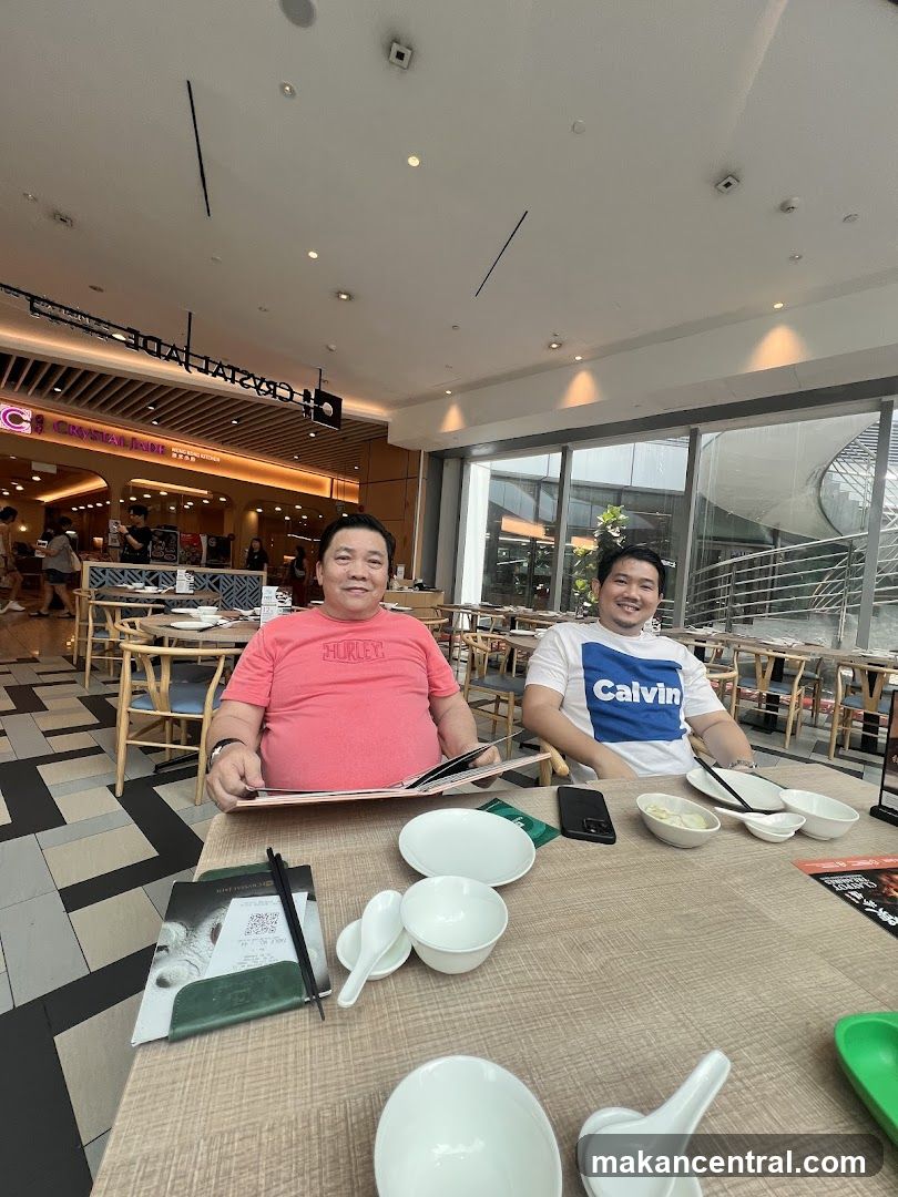 Two Men at a Restaurant Table