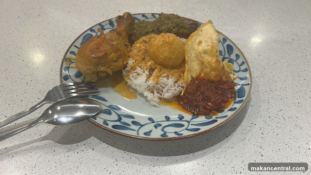 Plate of Rice with Chicken and Sides