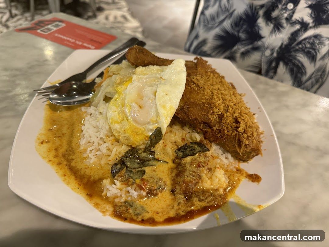 Nasi Lemak with Fried Chicken and Egg