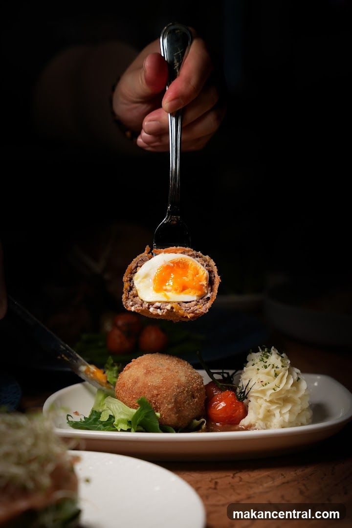 Scotch Egg with Mashed Potatoes and Tomatoes