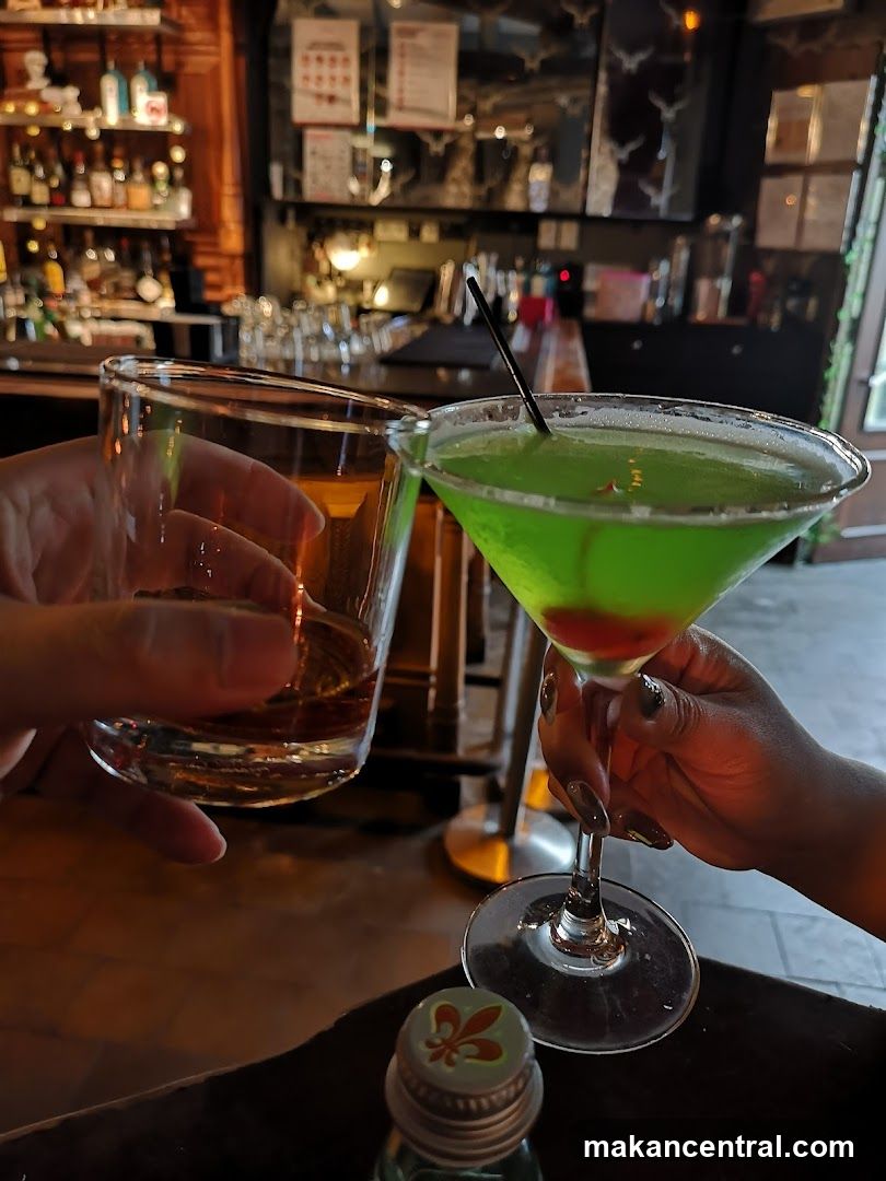 Cheers with Cocktails at a Bar