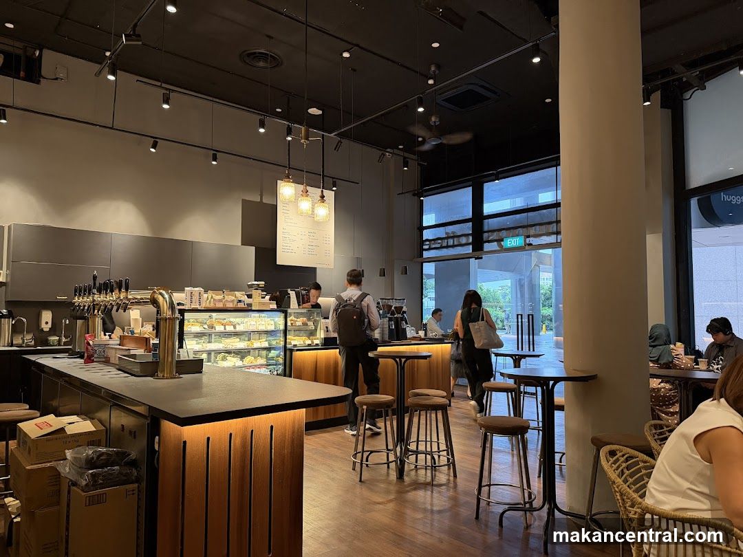 Cafe Interior with Display Cases and Seating