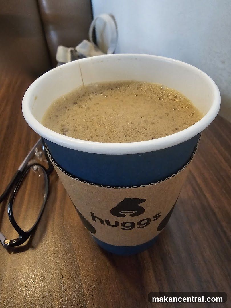 Coffee in a Huggs cup