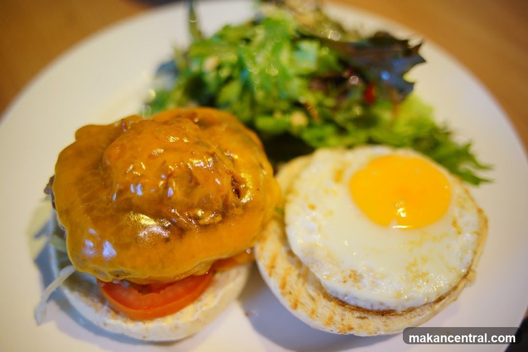 Cheeseburger with Fried Egg and Salad