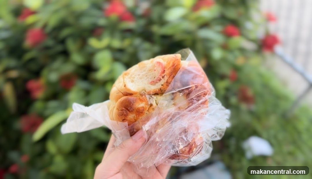 Hand holding a pastry
