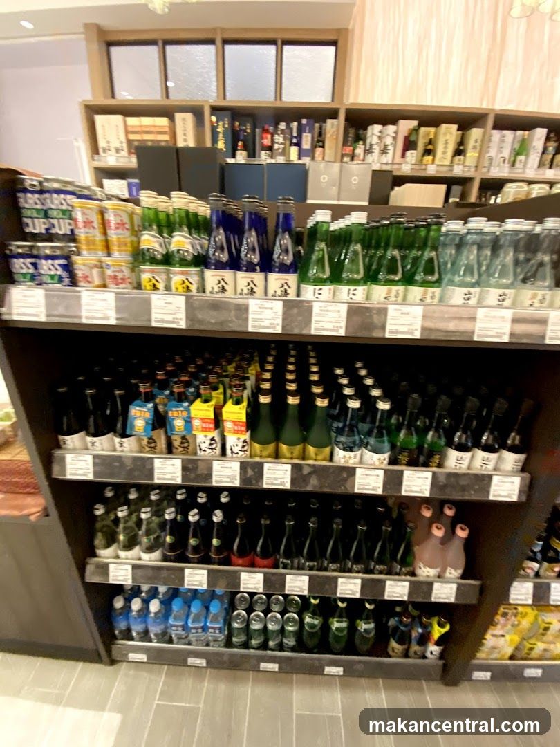 Bottles of Sake and Other Beverages on Shelves