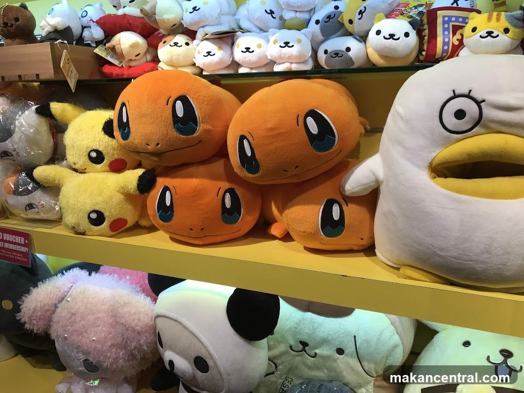 Pokemon and other plush toys on display
