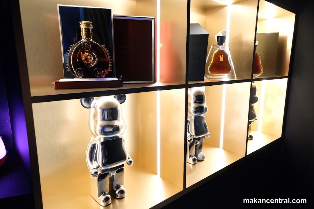 Display of Liquor Bottles and Collectible Figures