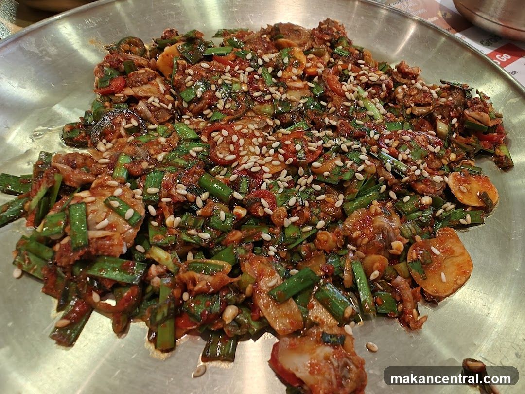 Spicy Stir-Fried Dish with Sesame Seeds
