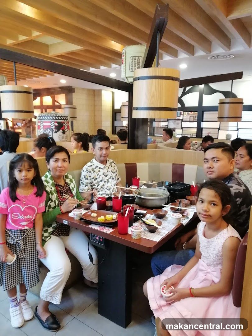 Family enjoying a meal at a restaurant