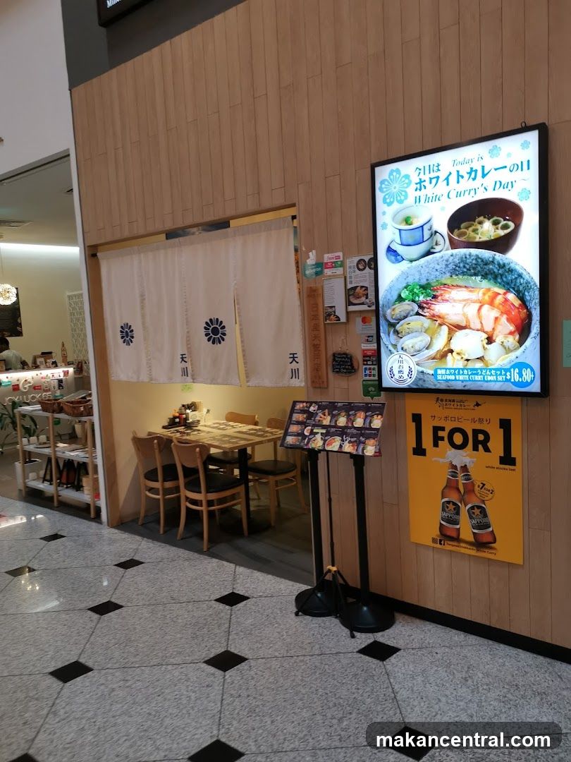 Restaurant Entrance with Menu and Advertisement