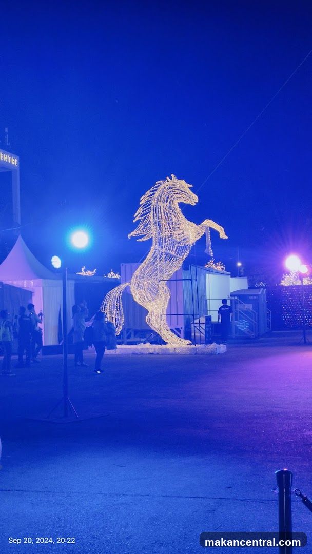Lighted Horse Sculpture at Night