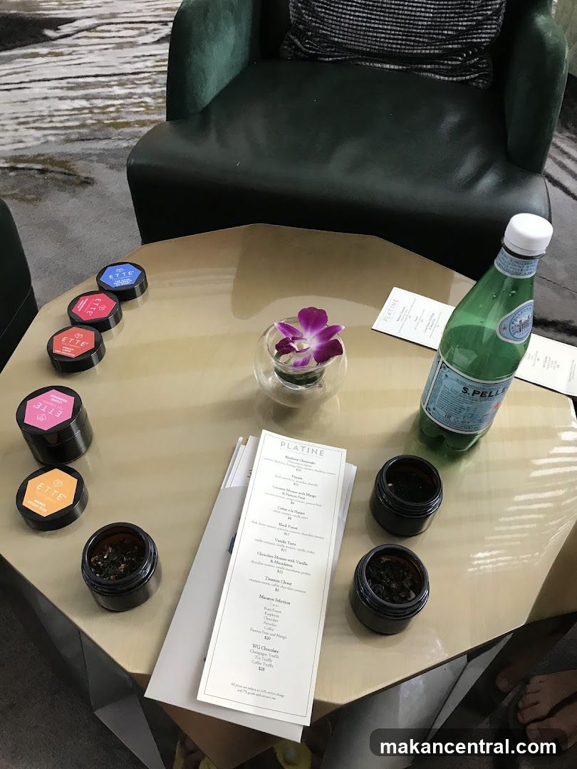 Table Setting with Tea Samples and Menu