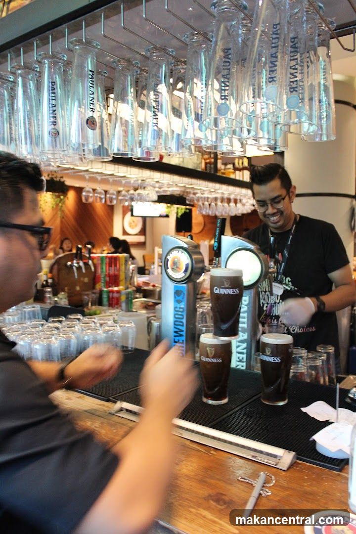 Bartender pouring Guinness