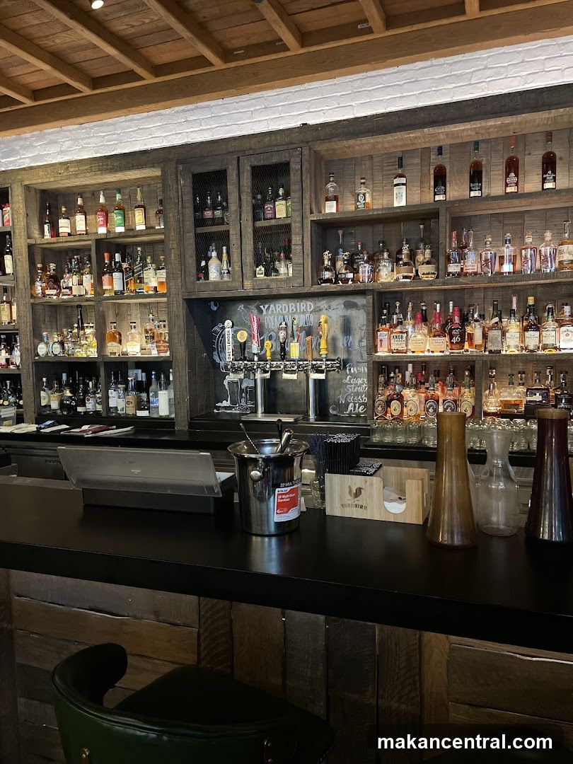 Bar Interior with Liquor Bottles and Taps