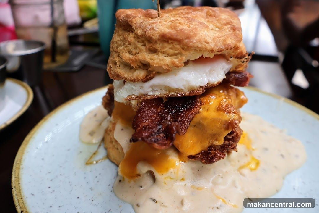 Biscuit Sandwich with Fried Chicken, Bacon, Egg, and Cheese