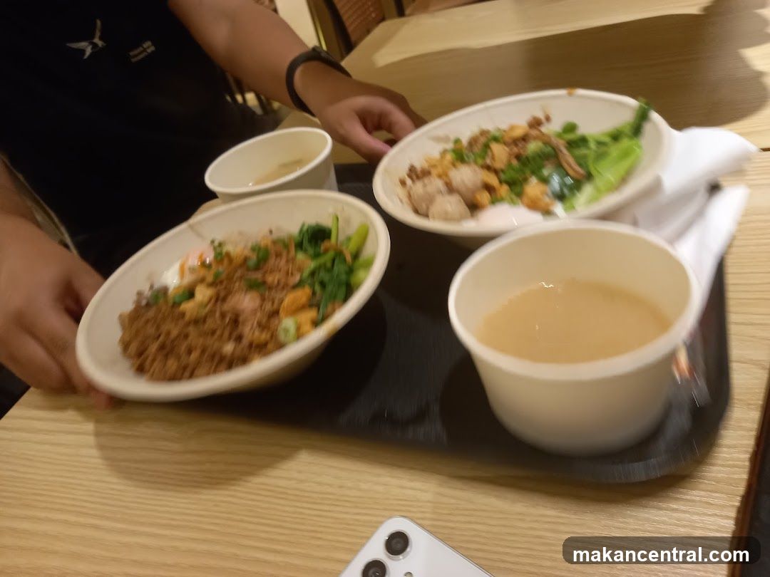 Two bowls of food and a cup of soup