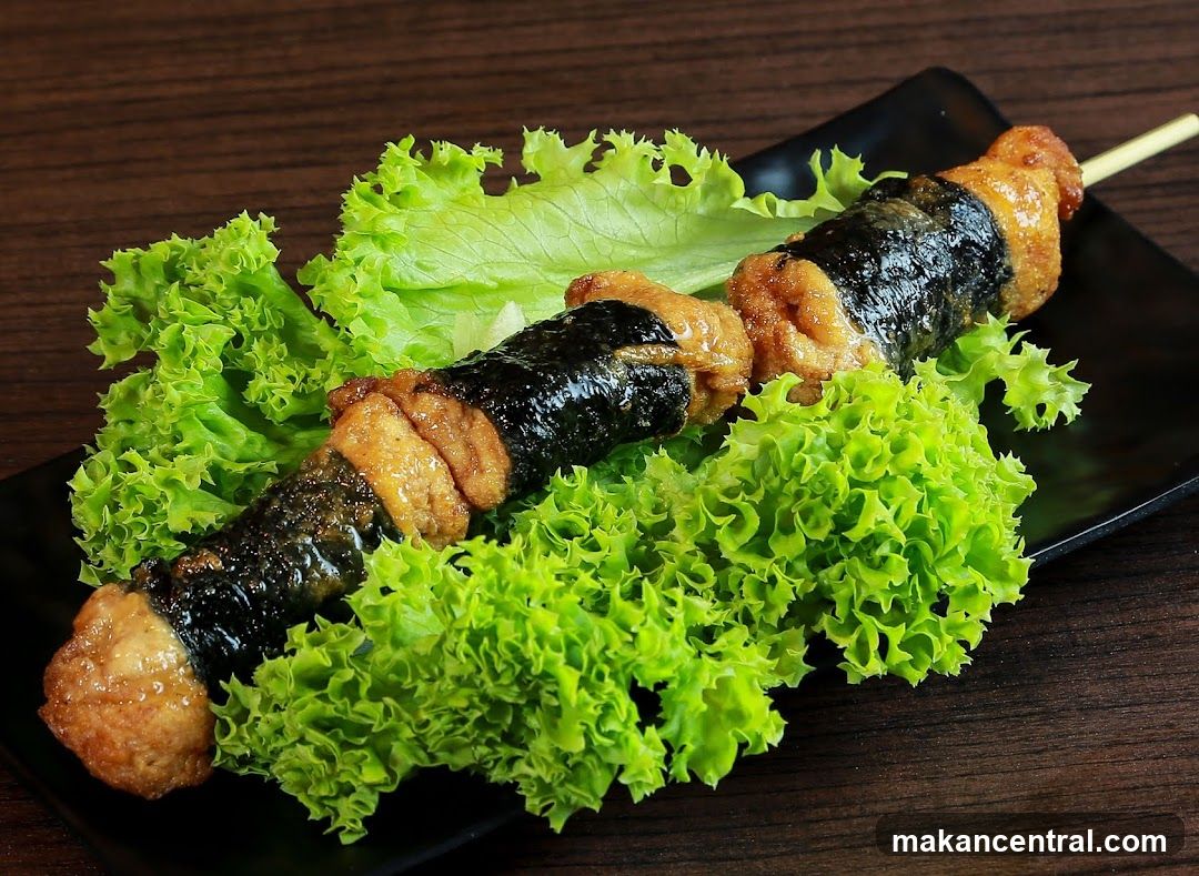 Skewered Food with Seaweed and Lettuce