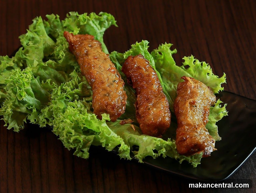 Fried Meat Rolls on Lettuce