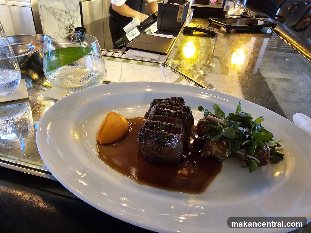 Steak Dinner at a Bar
