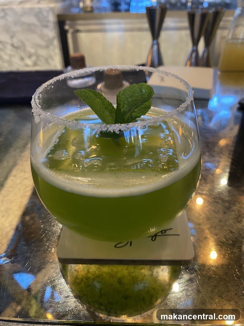 Green Cocktail with Mint Garnish