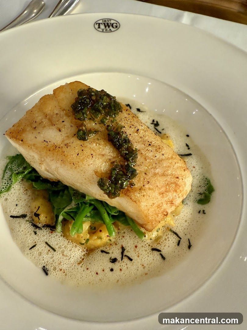 Fish dish with greens and foam