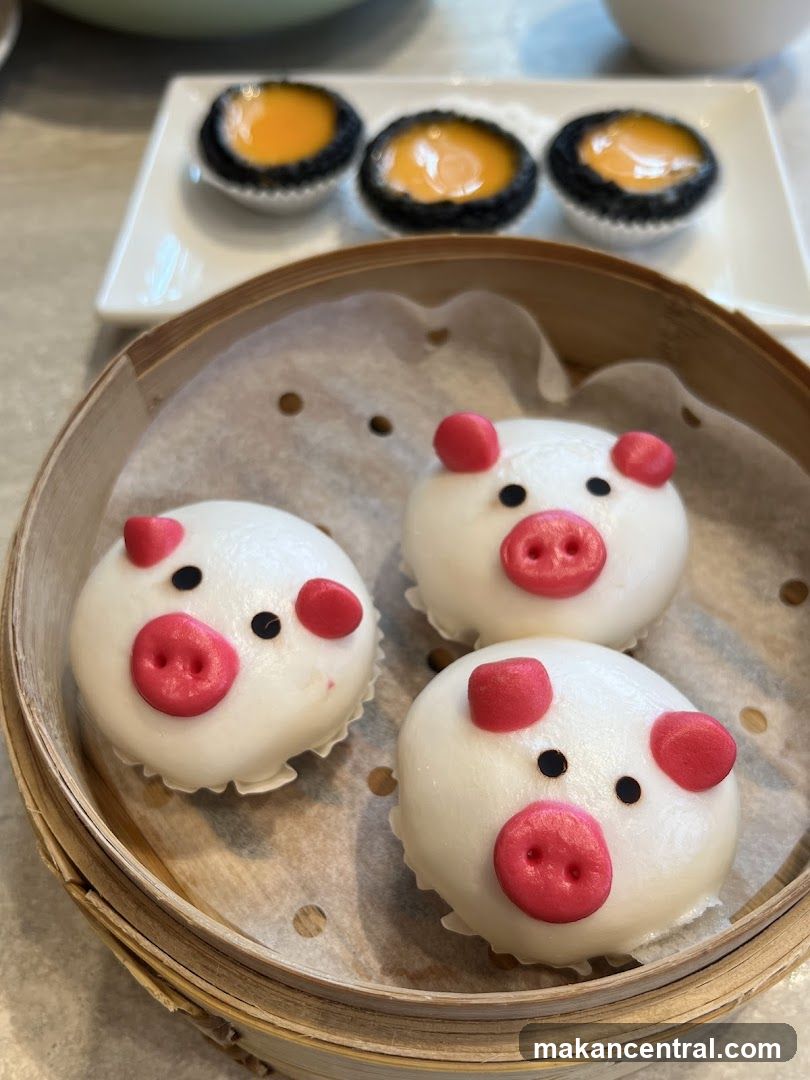 Pig-shaped buns and egg tarts