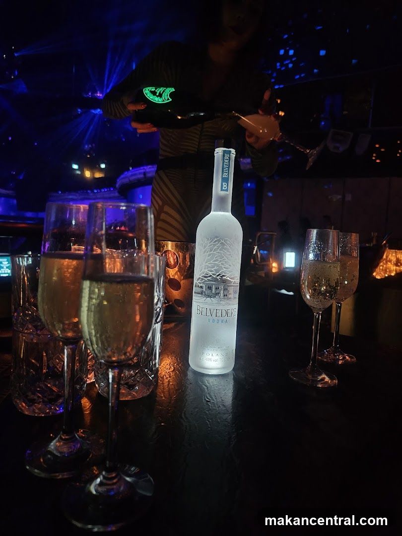 Champagne and Vodka at a Bar