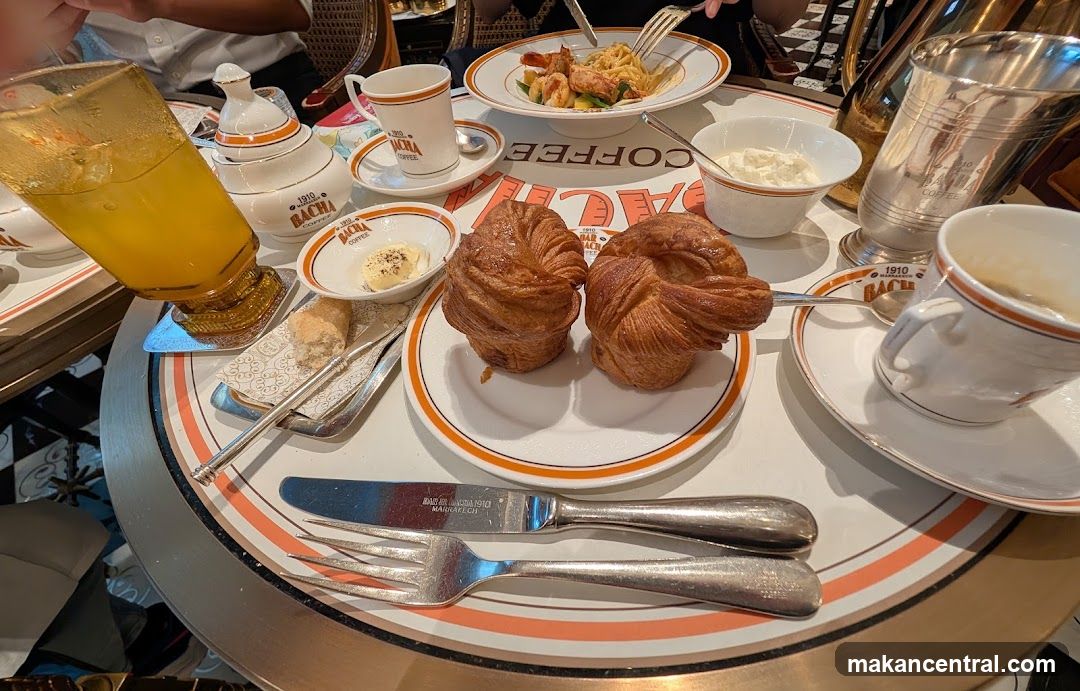 Breakfast spread with pastries and coffee