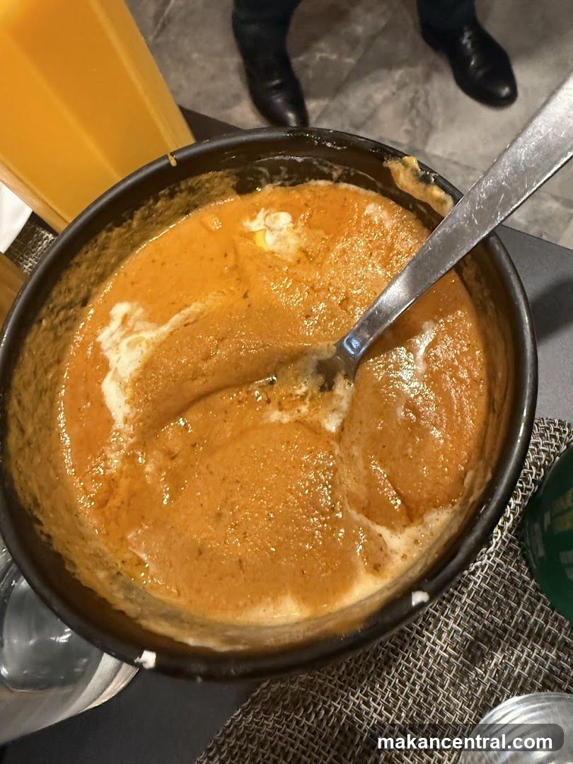 Curry Dish with Cream Swirl