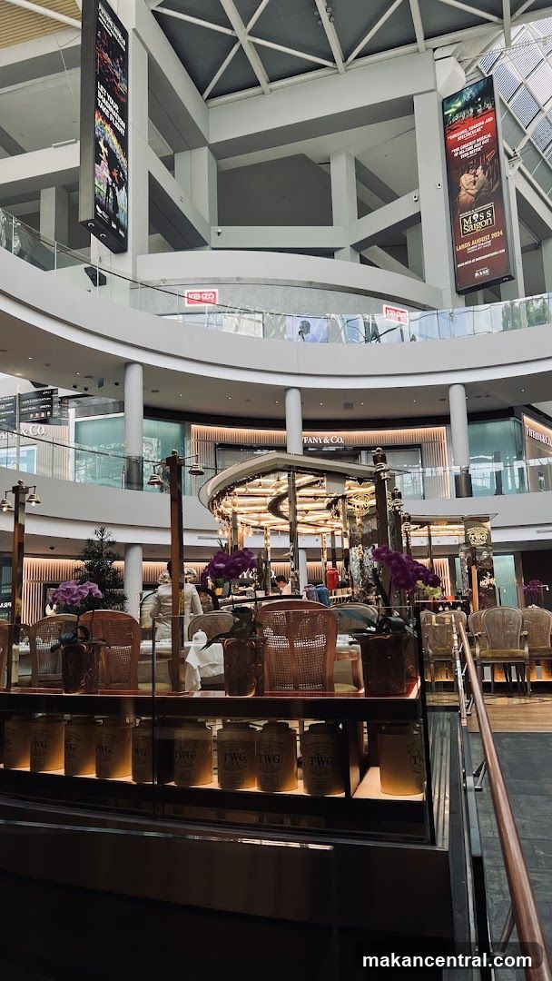 Interior of a shopping mall with a cafe