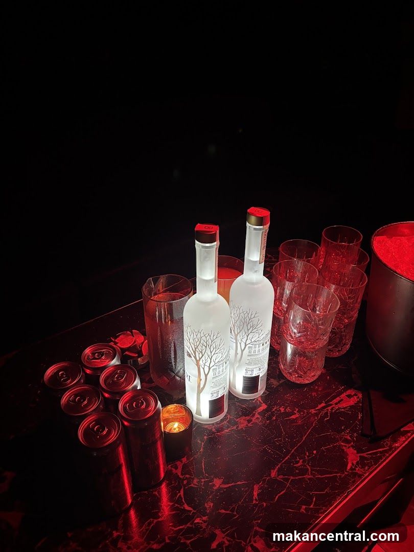 Vodka Bottles and Cans on a Bar